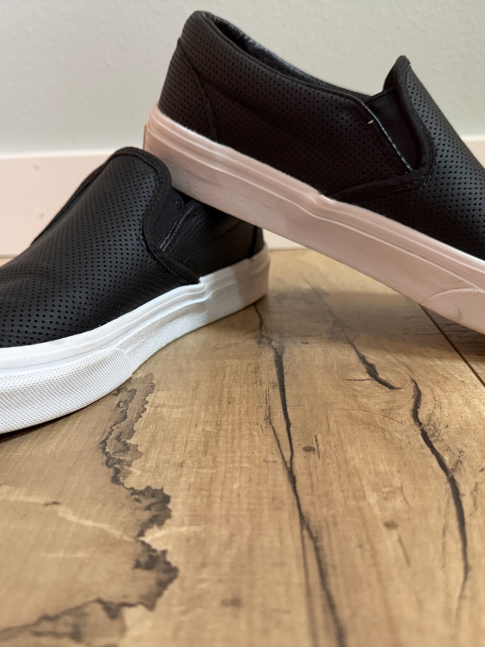 Vans Black Perforated Slip-On Sneakers with White Sole